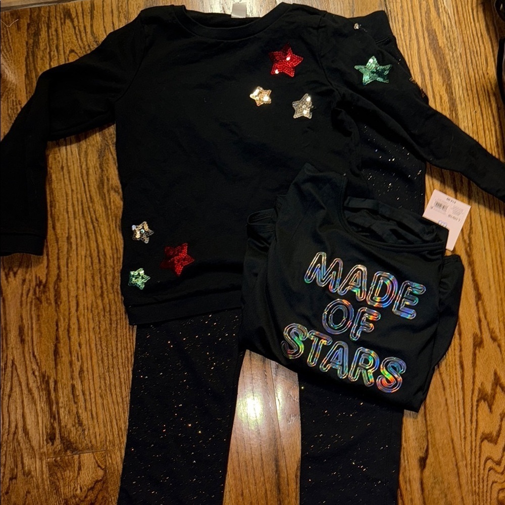 Stars and sparkles black sweatshirt, sweatpants and long sleeved top size 10/12